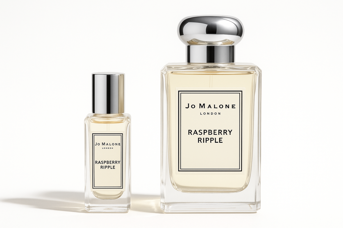 Jo Malone Raspberry Ripple 12 ml staaltje bottle standing next to the 100 ml bottle of Jo Malone Raspberry Ripple